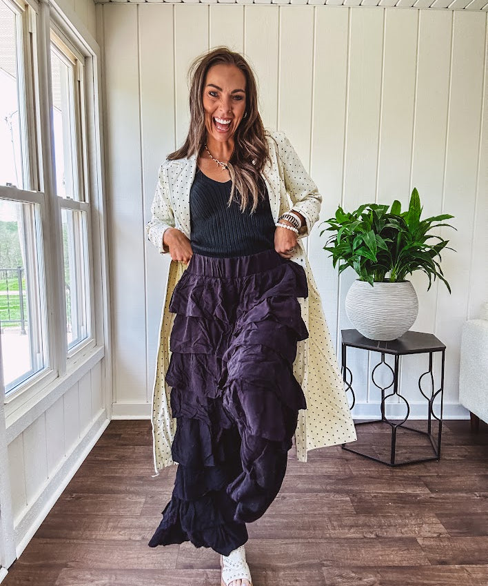 Black ruffled tiered pants, fully lined with elastic waist band.