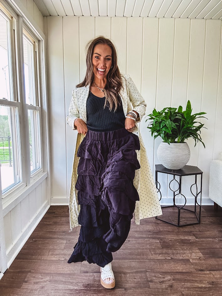 Black ruffled tiered pants, fully lined with elastic waist band.