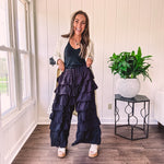 Black ruffled tiered pants, fully lined with elastic waist band.