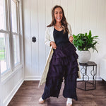 Black ruffled tiered pants, fully lined with elastic waist band.