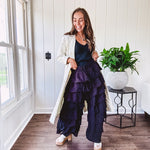Black ruffled tiered pants, fully lined with elastic waist band.