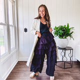 Black ruffled tiered pants, fully lined with elastic waist band.