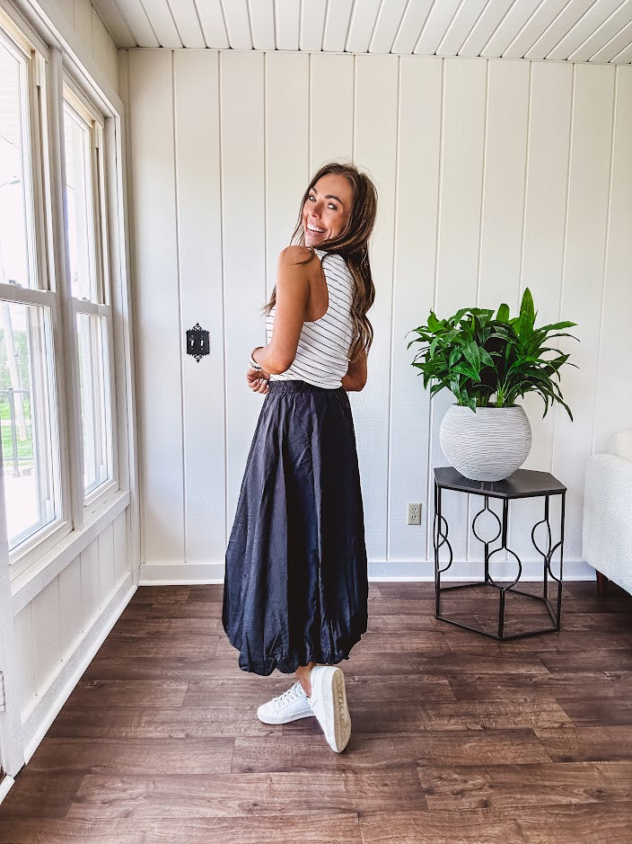 Soft and stretchy black and white striped tank with wide straps, square neckline and micro rib texture.