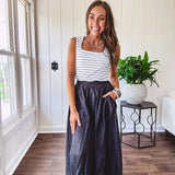 Soft and stretchy black and white striped tank with wide straps, square neckline and micro rib texture.
