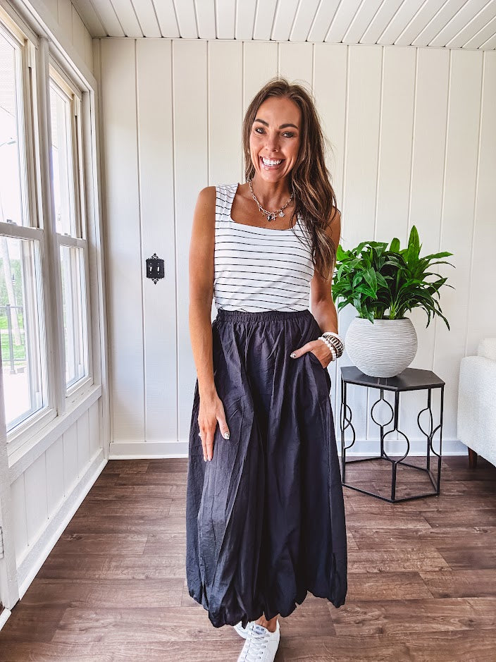 Soft and stretchy black and white striped tank with wide straps, square neckline and micro rib texture.