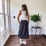 Soft and stretchy black and white striped tank with wide straps, square neckline and micro rib texture.