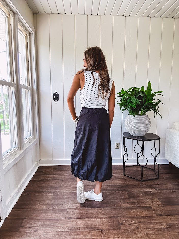 Soft and stretchy black and white striped tank with wide straps, square neckline and micro rib texture.
