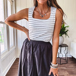Soft and stretchy black and white striped tank with wide straps, square neckline and micro rib texture.