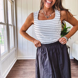 Soft and stretchy black and white striped tank with wide straps, square neckline and micro rib texture.