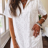 Lined cream denim-like short shift dress with V neck and collar, short sleeves,, contrasting tan stitching, front pocket and eyelet details throughout