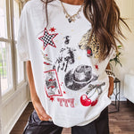 White oversized tee featuring a mixed print of black, red and cream in western, leo and playing card theme.
