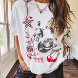White oversized tee featuring a mixed print of black, red and cream in western, leo and playing card theme.