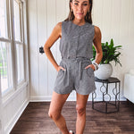 Lined black and white gingham shorts with matching belt, elastic back waist and pockets.