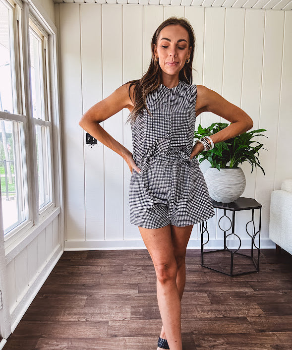 Lined black and white gingham shorts with matching belt, elastic back waist and pockets.