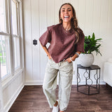 Cotton brown tee with a boxy cut and tie dyed underlayment peeking out of star cutouts, adorned with multicolor mini crystals.