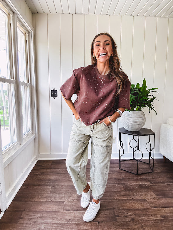 Cotton brown tee with a boxy cut and tie dyed underlayment peeking out of star cutouts, adorned with multicolor mini crystals.