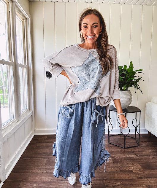 Oversized taupe waffle textured 3/4 sleeve top with lace detail and a denim star patch on the front with exposed seams.