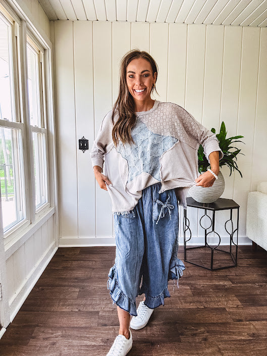 Oversized taupe waffle textured 3/4 sleeve top with lace detail and a denim star patch on the front with exposed seams.