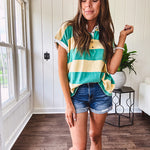 Oversized butter yellow and washed green wide striped Rugby style top with white collar and 1/4 metal button placket and cuffs.