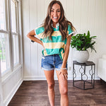 Oversized butter yellow and washed green wide striped Rugby style top with white collar and 1/4 metal button placket and cuffs.