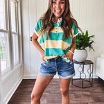Oversized butter yellow and washed green wide striped Rugby style top with white collar and 1/4 metal button placket and cuffs.