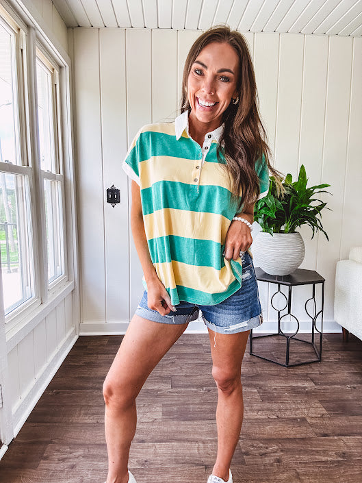 Oversized butter yellow and washed green wide striped Rugby style top with white collar and 1/4 metal button placket and cuffs.
