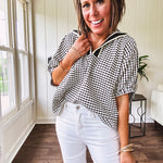 Lightweight black and white gingham dolman style top with mock neck, black and white striped V neck and elastic short sleeves.