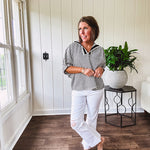 Lightweight black and white gingham dolman style top with mock neck, black and white striped V neck and elastic short sleeves.