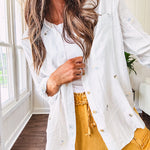 Thin, lightweight long sleeved button down blouse featuring white and blue or olive stripes adorned with small pastel floral embroidery throughout.