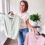 Soft, woven sweater vest with cap sleeves and faux wooden buttons down the front available in cream, sage and blush.