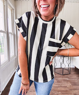 Soft, lightweight black and ivory color block striped tee with cuffed sleeves and front pocket.