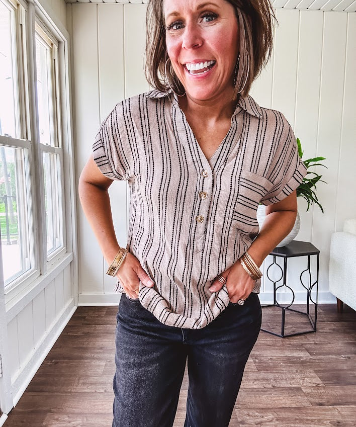 Soft, lightweight mocha and black striped collared shirt with V neck and 3 faux wooden buttons on the front, front pocket and cuffed sleeves.
