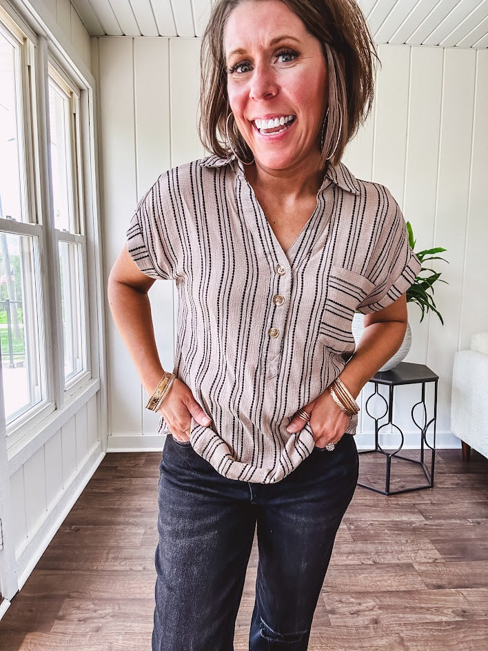 Soft, lightweight mocha and black striped collared shirt with V neck and 3 faux wooden buttons on the front, front pocket and cuffed sleeves.