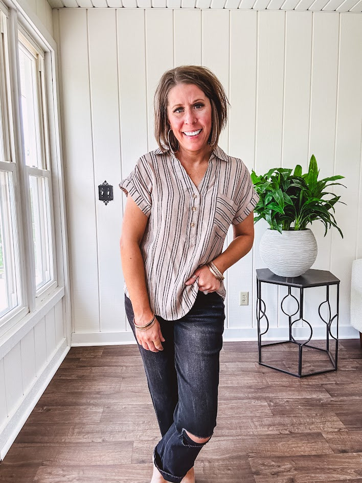 Soft, lightweight mocha and black striped collared shirt with V neck and 3 faux wooden buttons on the front, front pocket and cuffed sleeves.