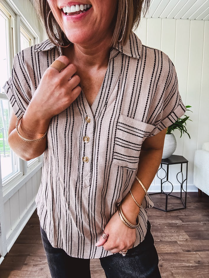 Soft, lightweight mocha and black striped collared shirt with V neck and 3 faux wooden buttons on the front, front pocket and cuffed sleeves.
