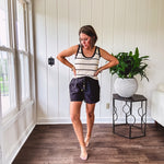 Soft, crocheted oatmeal and black striped round neck tank with black trim.