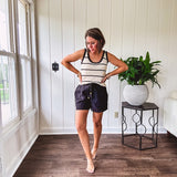 Soft, crocheted oatmeal and black striped round neck tank with black trim.