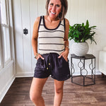 Soft, crocheted oatmeal and black striped round neck tank with black trim.