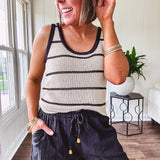 Soft, crocheted oatmeal and black striped round neck tank with black trim.