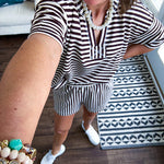Lightweight terry-like textured fabric in cream and dark brown stripes with V neck, short sleeves and matching elastic waist shorts with pockets.