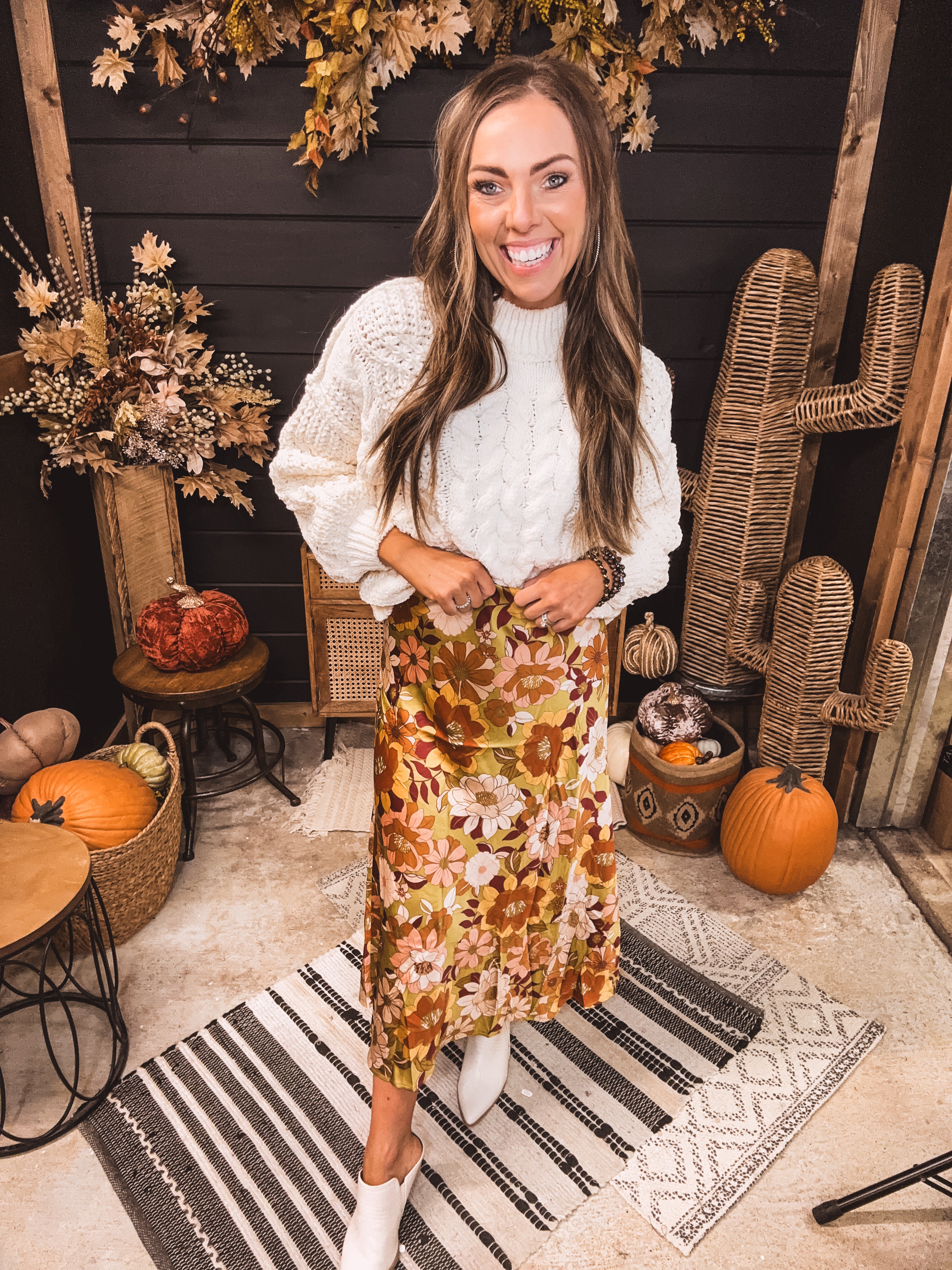 Silky gold, olive and maroon floral midi length skirt with elastic hem.