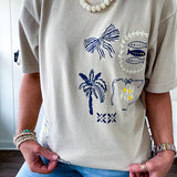Taupe cotton tee with navy, yellow and white ocean-inspired graphics.