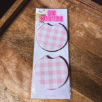 Two pink gingham neoprene car coasters
