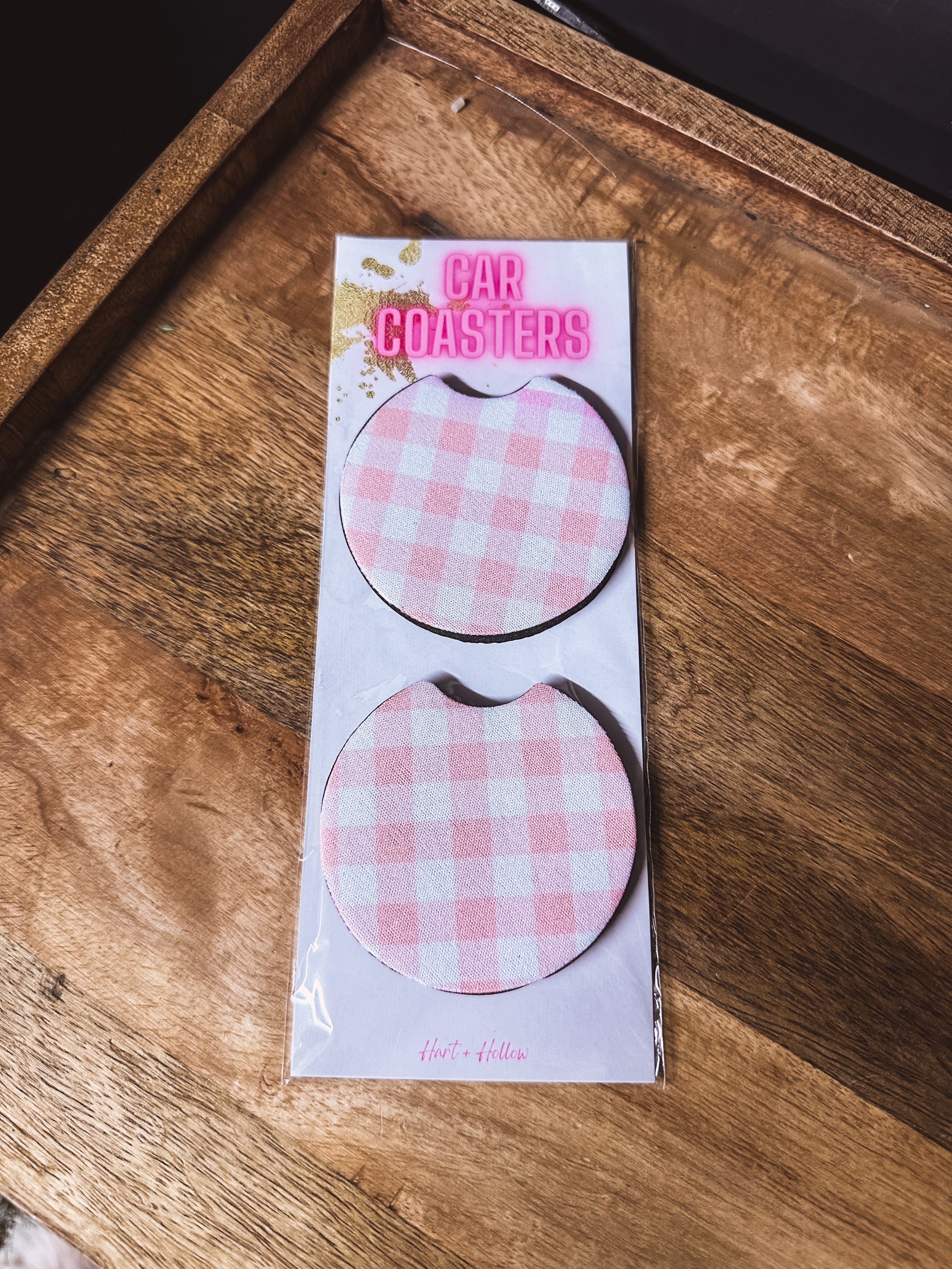 Two pink gingham neoprene car coasters