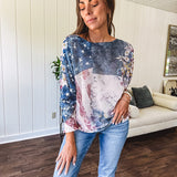 Made in Italy in muted navy, cream and berry with vintage florals and stars and stripes, long sleeved boat neck batwing sweater.