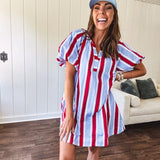 Light blue, white and red striped mini dress featuring a V neck and mock collar, puffed sleeves and pockets.