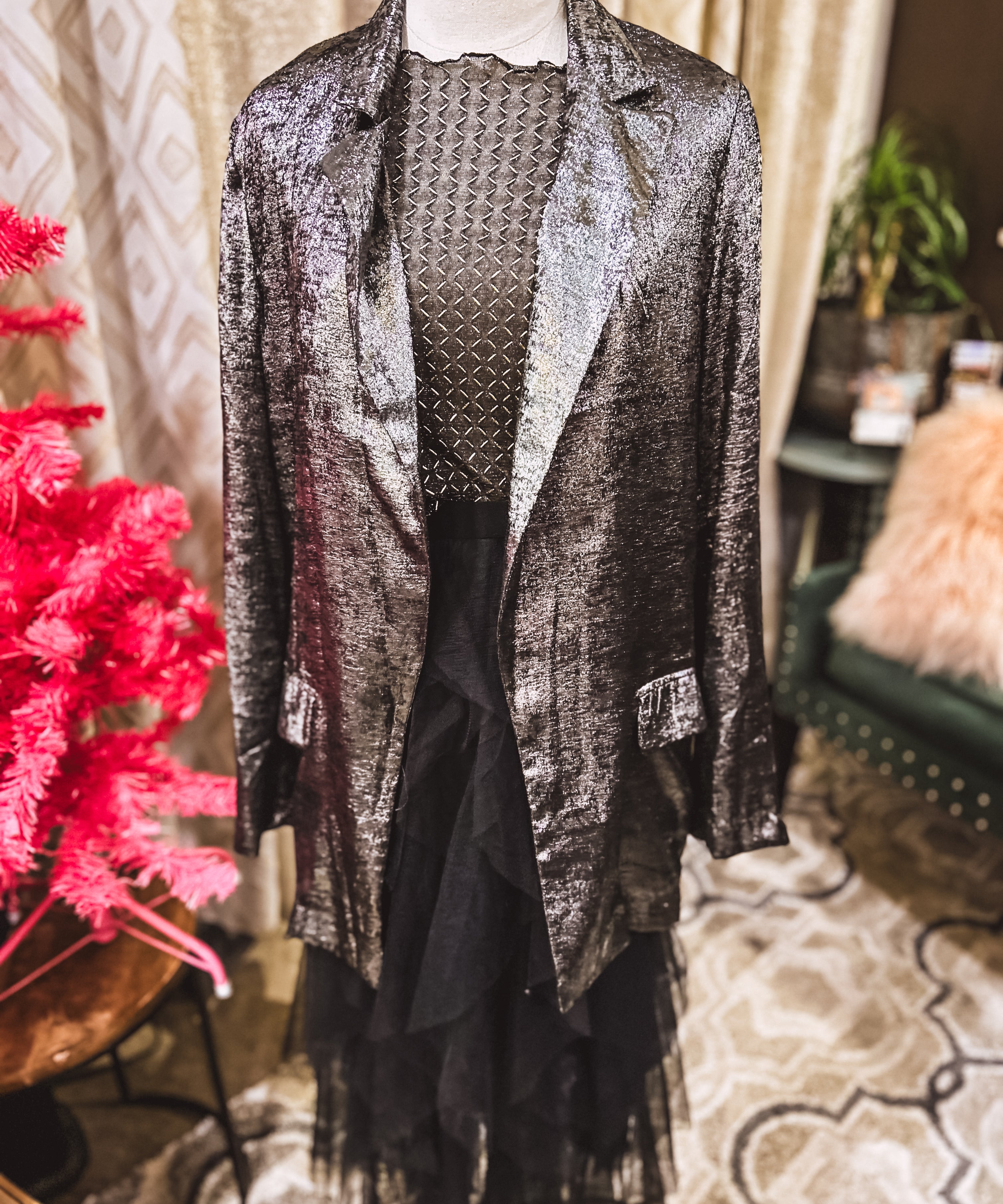 Black long sleeved mesh with gold diamond pattern.