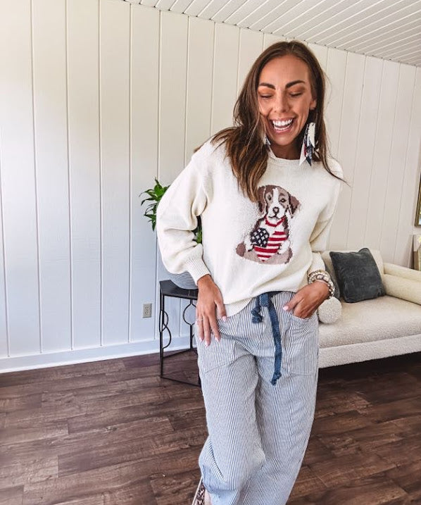 Cream and dusty blue thin striped barrel pants with silver grommet belt loops and dusty blue rope belt with oversized pockets.