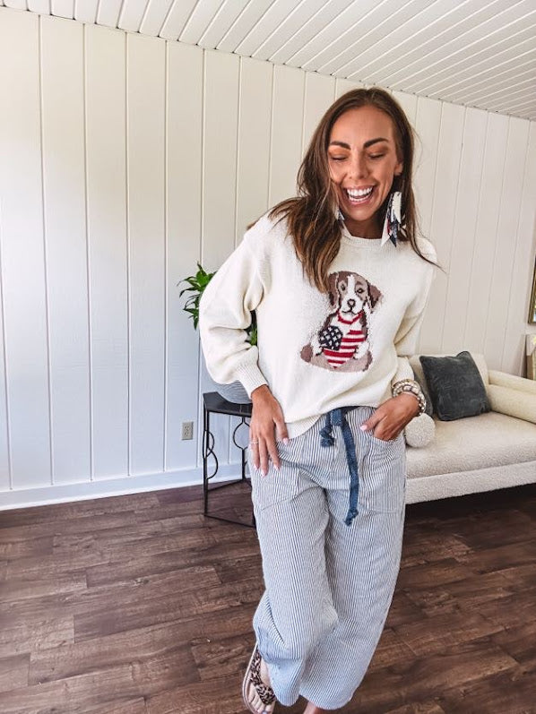 Cream and dusty blue thin striped barrel pants with silver grommet belt loops and dusty blue rope belt with oversized pockets.