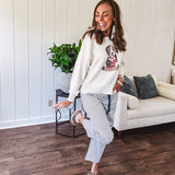 Cream and dusty blue thin striped barrel pants with silver grommet belt loops and dusty blue rope belt with oversized pockets.